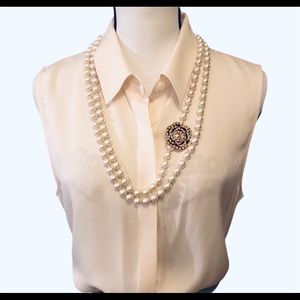 Theory Tanelis Sleeveless Silk blouse.